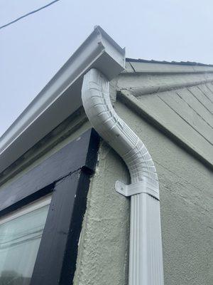 New downspout on seamless gutter.