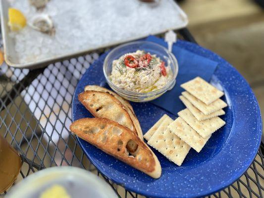 Crab dip, baguettes and saltines