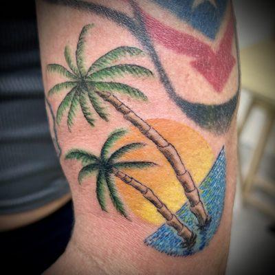 Palm trees beach tattoo by Heather Pilapil.