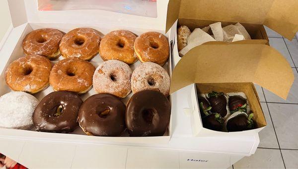 Glazed, chocolate dipped, sugar coated and one jelly filled powdered doughnut