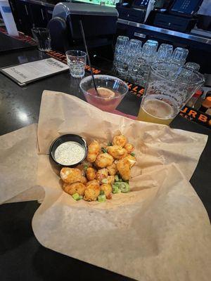 Cheese curds, huckleberry lemon drop and a beer