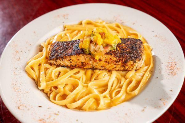 Blackened Salmon over a bed of linguine.