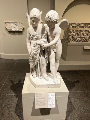 This is such a cute sculpture of Cupid and Psyche. Very well preserved.