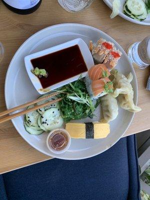 Washougal roll, chili ponzu roll, seaweed salad, cucumber salad, tomato, gyoza. Yum!