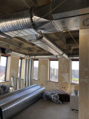 Here is a project where we install flat oval spiral duct work for a customer that had low ceiling height.