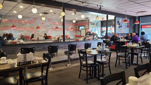 Dining room, counter, and front area seating.