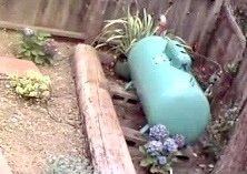 new tank on temporary platform awaiting its move to the other side of the fence.