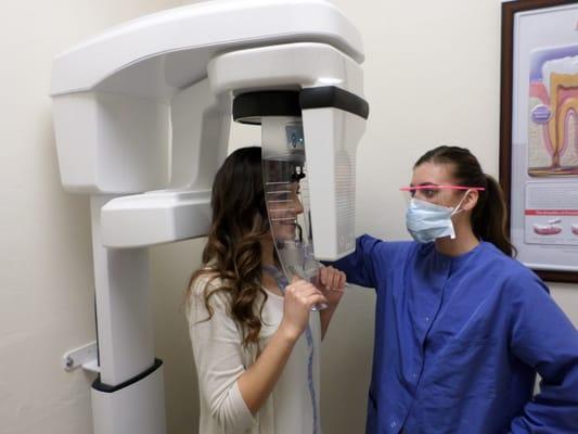 Our panoramic machine takes a digital x-ray showing the entire upper and lower jaw.