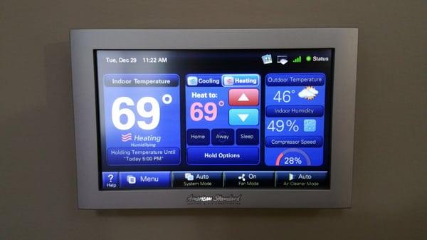 American Standard Platinum 950 thermostat with remote access and scrolling picture frame
 https://www.americanstandardair.com/products/therm