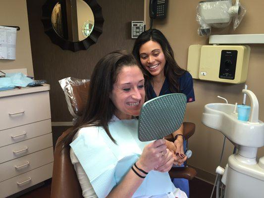 Smile reveal moment for teeth whitening patient at The Center for Cosmetic Dentistry Smithtown NY