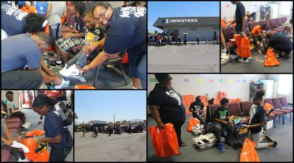 2015 Annual Back-to-School Shoe Drive. We gave out nearly 400 brand new pairs of Nike shoes, socks, and school supplies to the community