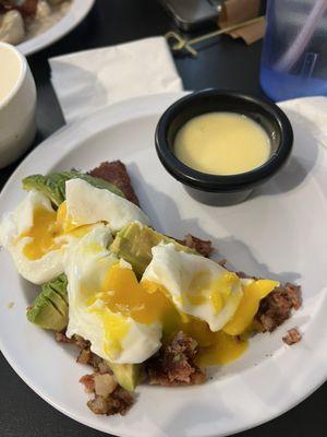 Side of avocado, 2 eggs (poached), hash, side of hollandaise sauce put together myself!