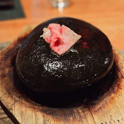 Wagyu beef sizzling on our personal 500 degree stone.