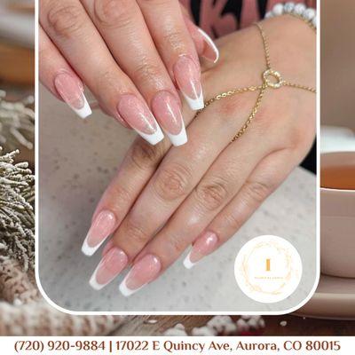 Celebrate the season in style with French tip nails that are ready for the New Year!  Book your appointment today!