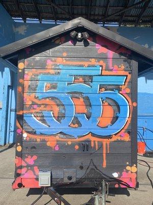 Our Triple 5 logo in graffiti