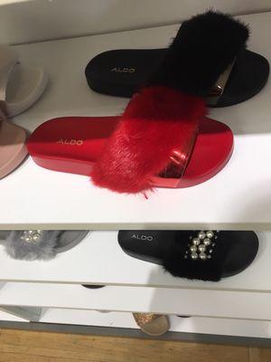 Aldo has some of the cutest shoes out right now.. super cute red slides.