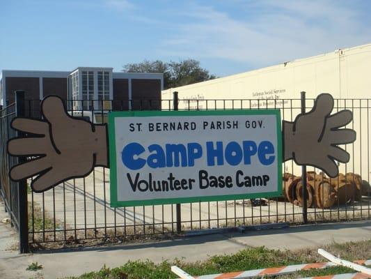 camp hope fence sign.