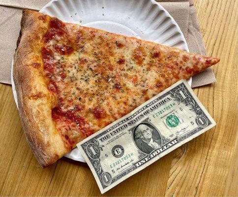 A slice with a USD for comparison