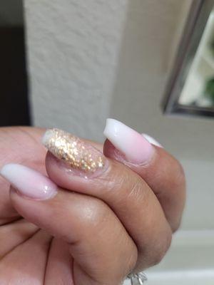 Bad polish, glitter barely covering the whole nail