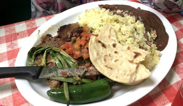 T-bone steak, delicious creamed frijoles