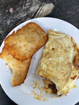 Mexicano omelette and 2 hash browns