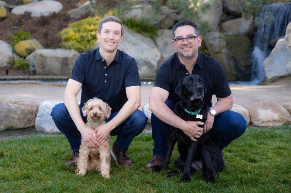 Dr. Mark Phillpe, Dr. Derek Hauser, Nilla and Stella. Our dentists and dental therapy dogs our patients love at Lakefront Family Dentistry!