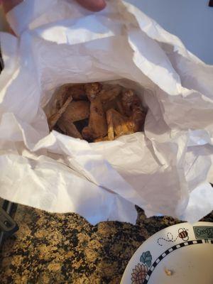 Wings,  served in paper bags so they don't get soggy