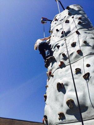 Climb on 24 ft mobile rock wall