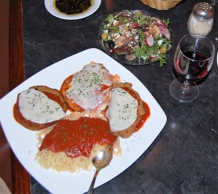 Eggplant, Veal and Chicken Parmesan combo platter with a side of spaghetti. All were very good.