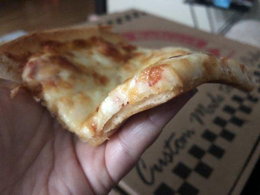 Thin crispy deliciousness, extra cheese pizza