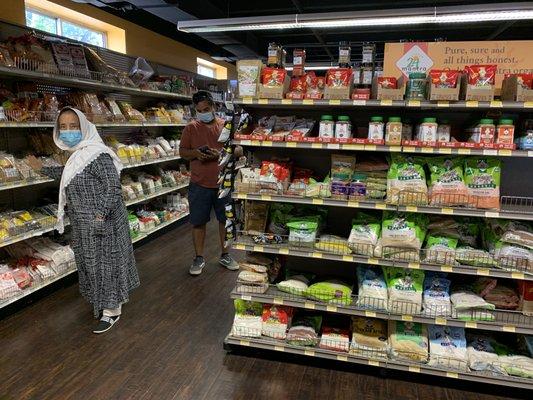 My wife Sabiha Sagri and son Tauqir Sagri are browsing the shelves.