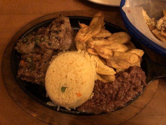 Steak is flavorful and juicy, plantain is great, but the past part of this plate is the fried rice! Yum