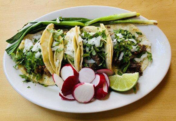 Lengua and Al Pastor tacos.