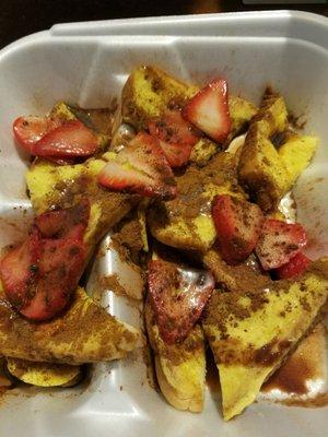 Takeout cinnamon swirl French toast with strawberries