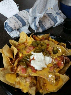 Mucho Nachos and two tacos.