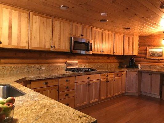 Gorgeous Lodge kitchen. Fully stocked with staples, pots/pans, service for 30, small appliances, & full suite of stainless steel appliances.