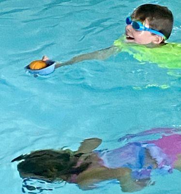 Swimming with Pumpkins at our annual Pumpkin Poolooza