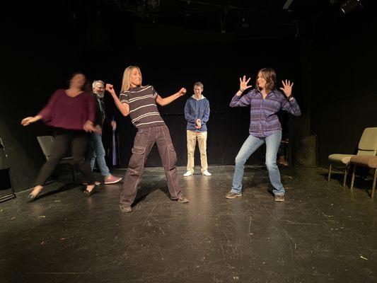 Some of our Foundation level students making the audience laugh it up while they do an improvised game.