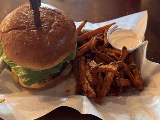 Fresh roll, local fresh meat and cheese.  Incredible sweet potato fries and fry sauce.