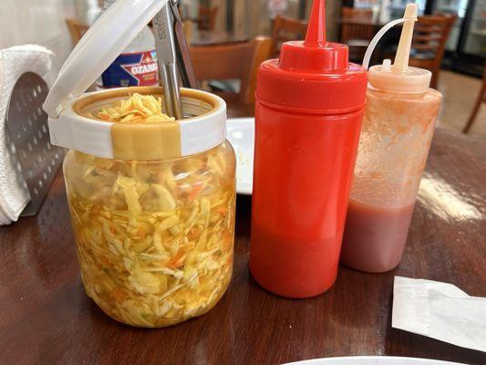 Curtido (Salvadoran Spicy Slaw) with green and red salsa