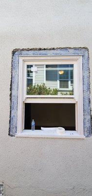 Double hung window with weights and rope.