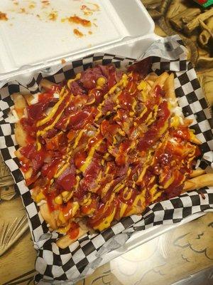 Pastrami Fries!! Cheese melted throughout layer of fries!! Toppings on each fork till the end!!