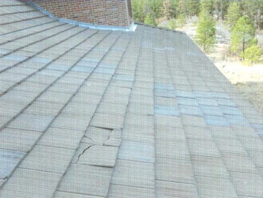 Broken shingles from foot traffic, don't let just anyone on your roof. Call us, our inspectors are Haag trained.