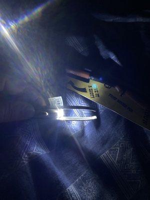 The light from the tweezers.