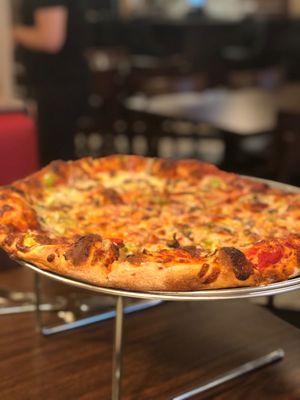 Build your own pizza: Ground beef, mushrooms green peppers & onions. Cooked well done.