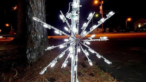 Christmas decor near pedestrian entrance to GREATEST GENERATION MEMORIAL PARK in Thomaston, Georgia.