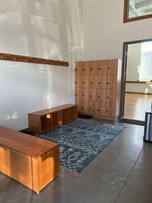 lobby area, lockers and cubbies for storing belongings