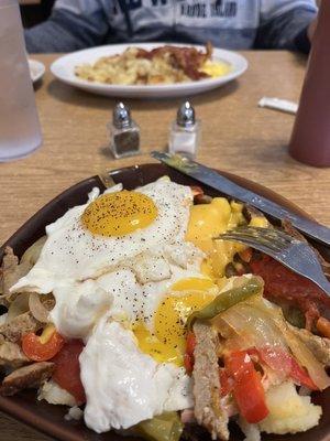 Top- bacon/eggs/home fries; bottom- skillet