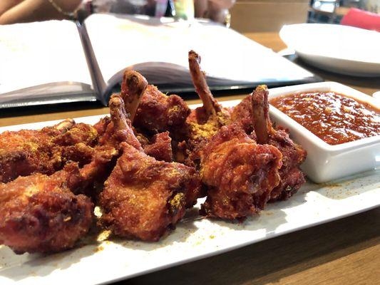 Murgh lollipop -- spicy chicken drumsticks. Delicious! Warning: The chutney is HOT!