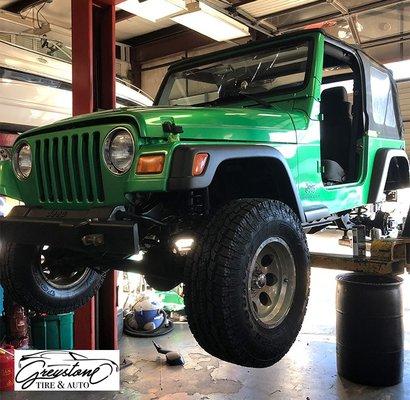 Working on a Jeep in the Shop